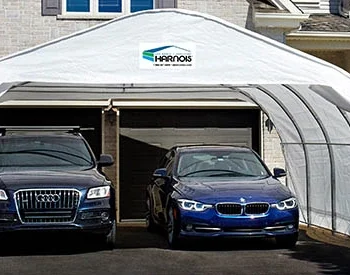 Abri Harnois XR18-XR20 en acier galvanisé avec toile 7 oz soudée et ancrages cavalier Harnois, idéal pour deux voitures.